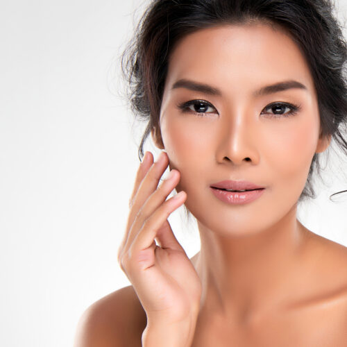 Women and men are opting for Dermal Fillers, injectables and Facetite - showing asian woman on image